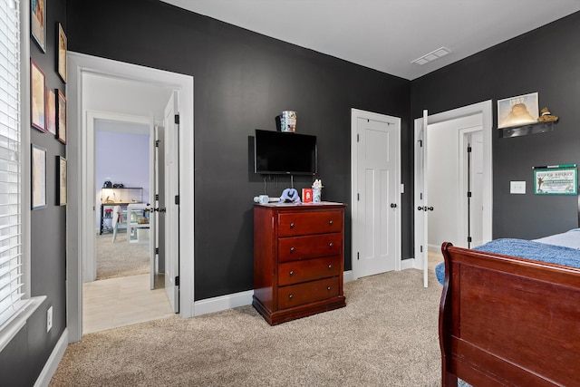 9726 Haven Port Ln, Ooltewah, TN 37363 - bedroom with baseboards, visible vents, and light colored carpet
