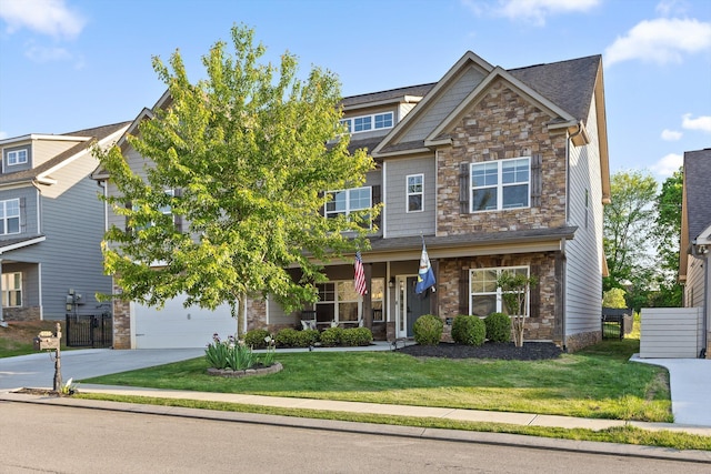 9726 Haven Port Ln, Ooltewah, TN 37363 - craftsman-style home featuring stone siding, a front lawn, and driveway