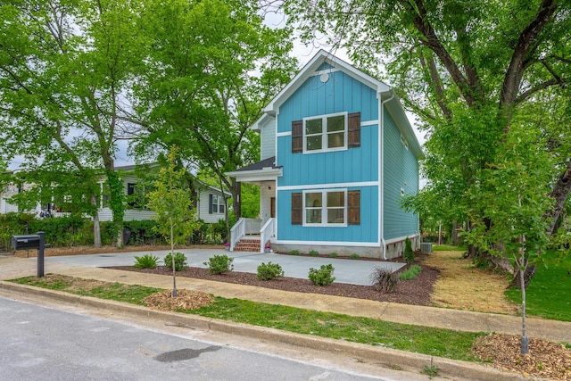 2111 Ivy St, Chattanooga, TN 37404 - view of front of house with central air condition unit and board and batten siding