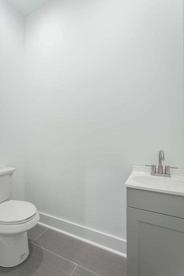 2111 Ivy St, Chattanooga, TN 37404 - half bath with tile patterned floors, vanity, and toilet