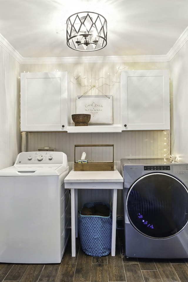 washroom featuring dark wood-type flooring, washer / dryer, and crown molding