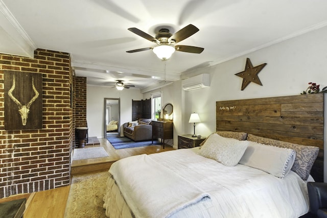 bedroom with a wall mounted air conditioner, wood finished floors, brick wall, and ornamental molding