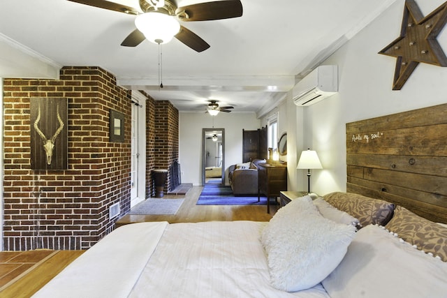 bedroom featuring crown molding, an AC wall unit, brick wall, and wood finished floors