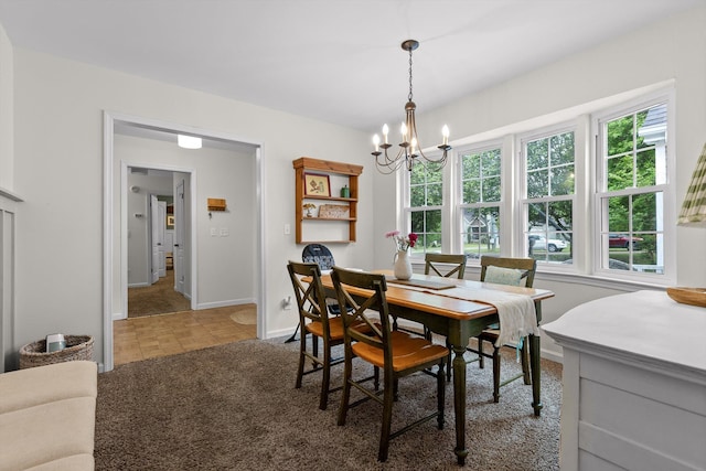 7403 Flagstone Dr, Ooltewah, TN 37363 - dining room featuring baseboards and a notable chandelier