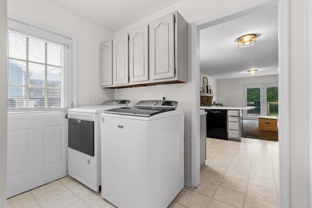 7403 Flagstone Dr, Ooltewah, TN 37363 - laundry room featuring light floors, washing machine and dryer, and cabinet space