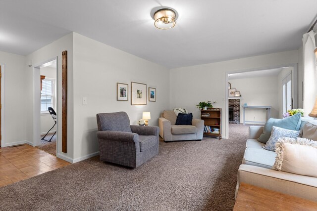 7403 Flagstone Dr, Ooltewah, TN 37363 - living room featuring baseboards, carpet flooring, and a fireplace