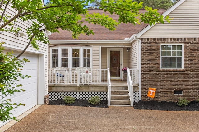 7403 Flagstone Dr, Ooltewah, TN 37363 - entrance to property with brick siding, an attached garage, roof with shingles, and crawl space
