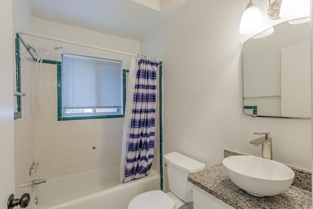 full bathroom with shower / bath combo with shower curtain, toilet, and vanity
