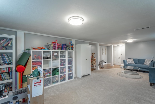 interior space featuring carpet floors and visible vents