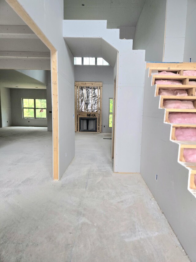 10586 Brownspring Dr Unit 113, Apison, TN 37302 - foyer entrance featuring a towering ceiling and unfinished concrete flooring