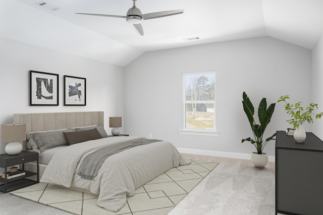 bedroom featuring vaulted ceiling, carpet floors, baseboards, and ceiling fan