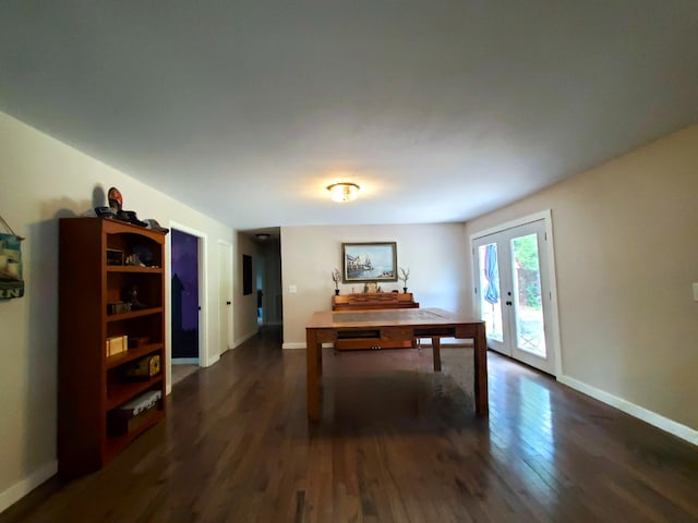 home office featuring baseboards, dark wood-style flooring, and french doors
