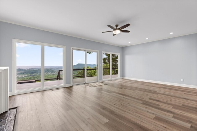 1206 Lower Brow Rd, Signal Mountain, TN 37377 - unfurnished living room with ceiling fan, wood finished floors, baseboards, ornamental molding, and recessed lighting