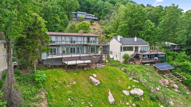 1206 Lower Brow Rd, Signal Mountain, TN 37377 - rear view of house featuring stairway, a deck, a wooded view, and a chimney