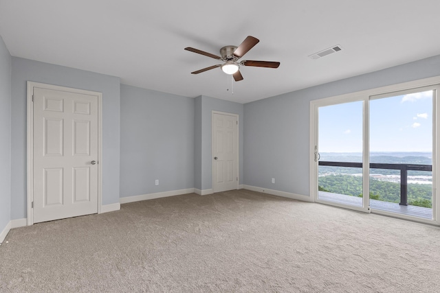 1206 Lower Brow Rd, Signal Mountain, TN 37377 - unfurnished bedroom with light colored carpet, baseboards, and ceiling fan