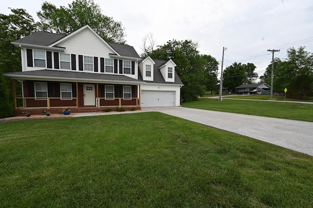view of front of house featuring covered porch, a front yard, brick siding, a shingled roof, and driveway