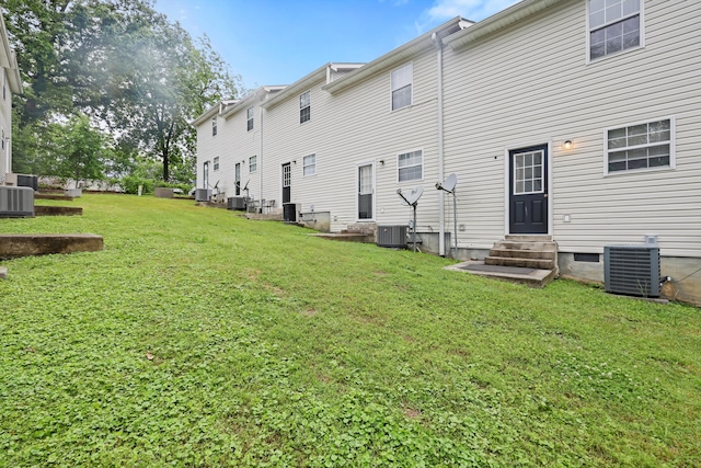 17 Bama Ln Unit C5, Ringgold, GA 30736 - back of house featuring entry steps, central air condition unit, and a yard