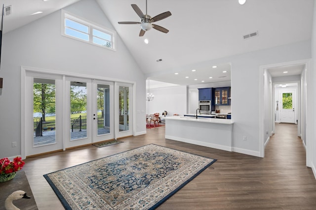 234 Reflection Dr, Dunlap, TN 37327 - living room with french doors, high vaulted ceiling, a ceiling fan, plenty of natural light, and dark wood-style flooring