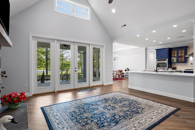 234 Reflection Dr, Dunlap, TN 37327 - living area with french doors, high vaulted ceiling, recessed lighting, dark wood-style floors, and baseboards