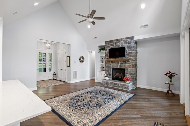 234 Reflection Dr, Dunlap, TN 37327 - living area with high vaulted ceiling, ceiling fan, a stone fireplace, baseboards, and wood finished floors