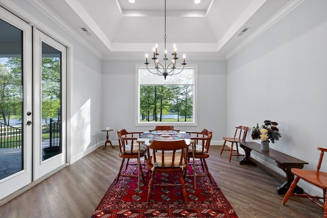 234 Reflection Dr, Dunlap, TN 37327 - dining area with a chandelier, wood finished floors, a tray ceiling, baseboards, and recessed lighting