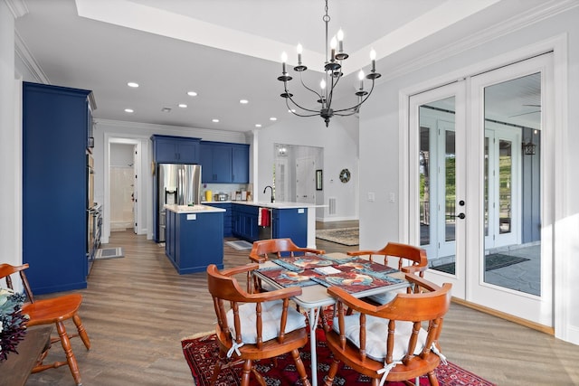 234 Reflection Dr, Dunlap, TN 37327 - dining area with french doors, recessed lighting, crown molding, light wood finished floors, and a chandelier