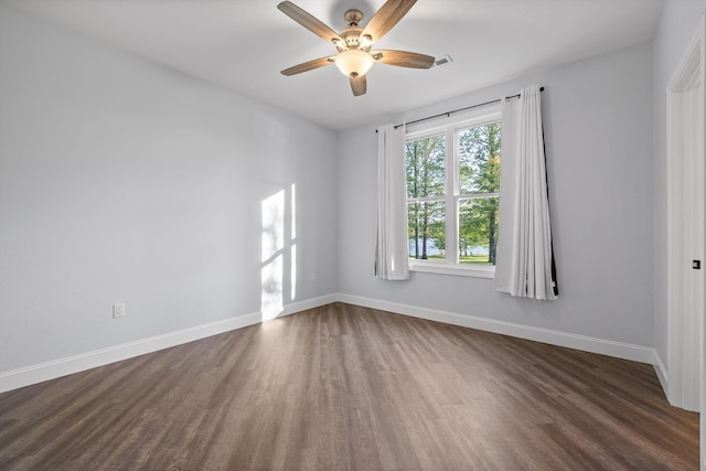 234 Reflection Dr, Dunlap, TN 37327 - empty room with dark wood finished floors, baseboards, and a ceiling fan