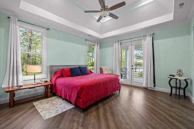 234 Reflection Dr, Dunlap, TN 37327 - bedroom featuring a raised ceiling, access to outside, wood finished floors, multiple windows, and crown molding