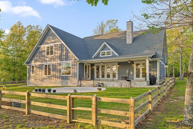 234 Reflection Dr, Dunlap, TN 37327 - rear view of property with french doors, board and batten siding, ceiling fan, a chimney, and a shingled roof