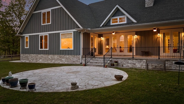 234 Reflection Dr, Dunlap, TN 37327 - rear view of property featuring french doors, a shingled roof, a patio, and a yard