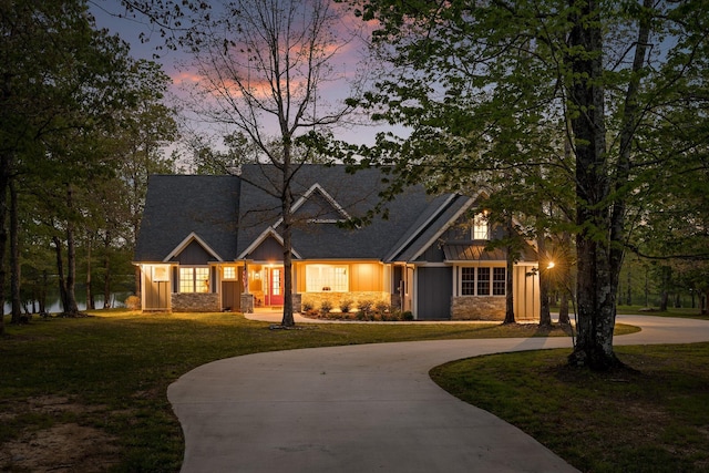 234 Reflection Dr, Dunlap, TN 37327 - craftsman-style home featuring curved driveway, a front lawn, and board and batten siding