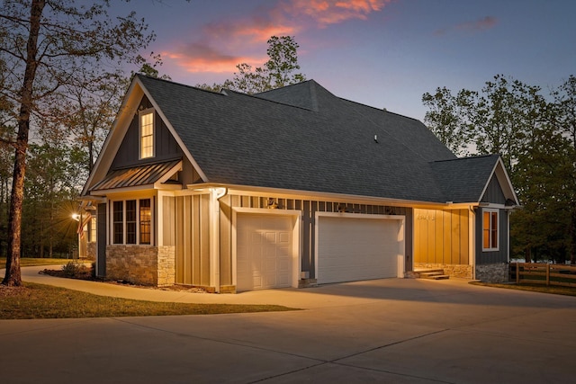 234 Reflection Dr, Dunlap, TN 37327 - view of front of home featuring board and batten siding, roof with shingles, driveway, and stone siding