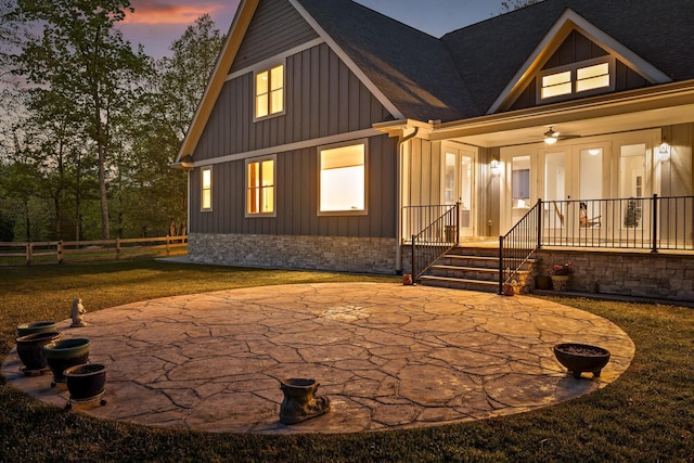 234 Reflection Dr, Dunlap, TN 37327 - back of house with roof with shingles, board and batten siding, a porch, and a patio