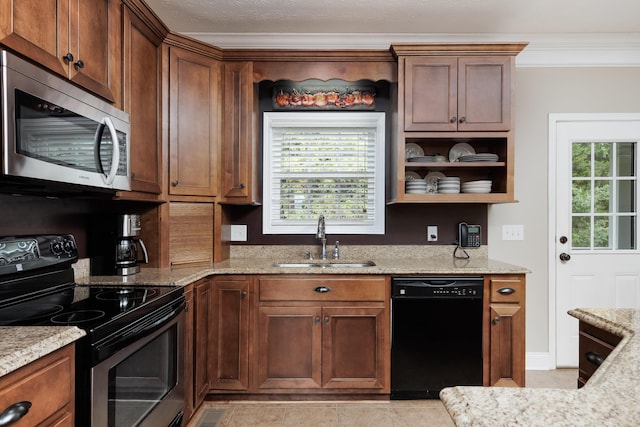 1594 Saunders Rd, Ringgold, GA 30736 - kitchen featuring appliances with stainless steel finishes, a sink, plenty of natural light, light stone countertops, and crown molding