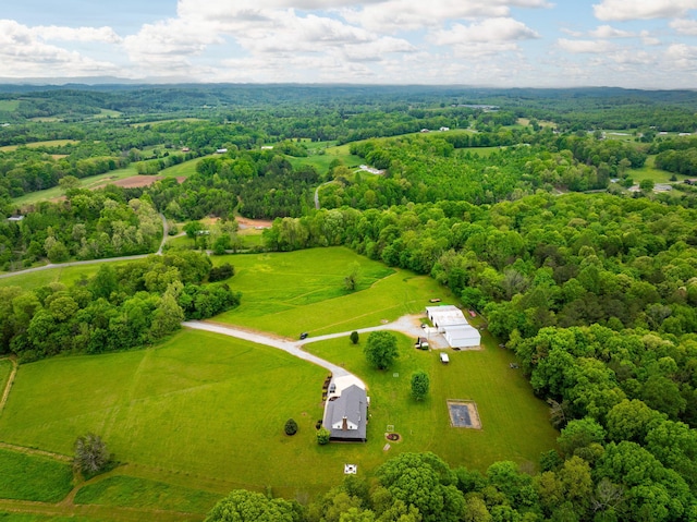 aerial view featuring a rural view and a forest view