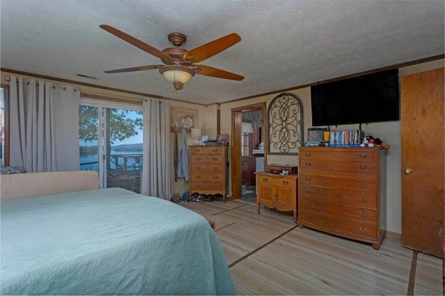 292 Hilltop Cir, Spring City, TN 37381 - bedroom with light wood-style floors, ceiling fan, a textured ceiling, and visible vents