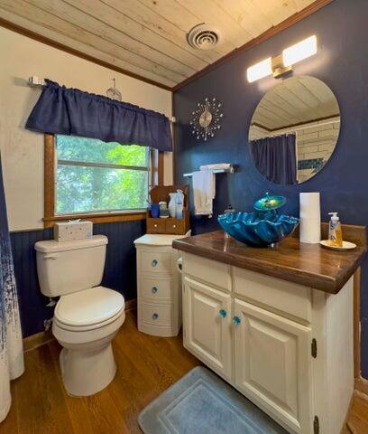 292 Hilltop Cir, Spring City, TN 37381 - full bath with crown molding, wood ceiling, wood finished floors, and visible vents