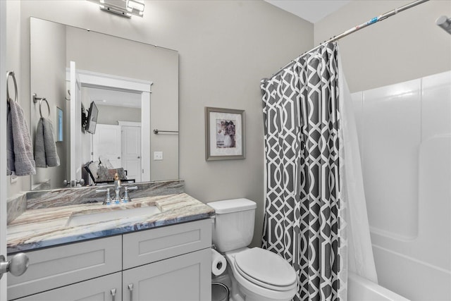 1383 Carrington Way, Chattanooga, TN 37405 - bathroom featuring shower / bath combo with shower curtain, toilet, and vanity