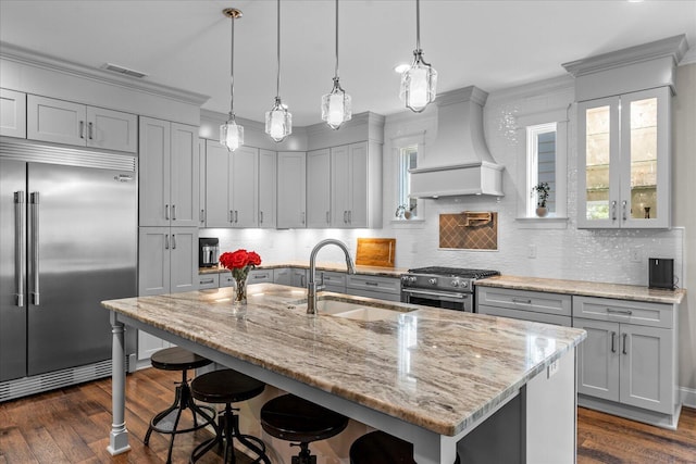1383 Carrington Way, Chattanooga, TN 37405 - kitchen featuring dark wood-style flooring, visible vents, a sink, high end appliances, and premium range hood