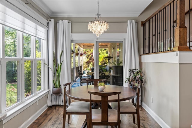 1383 Carrington Way, Chattanooga, TN 37405 - dining area with an inviting chandelier, baseboards, ornamental molding, and dark wood-style floors