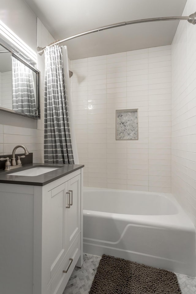 full bathroom featuring vanity, tasteful backsplash, and shower / bath combination with curtain