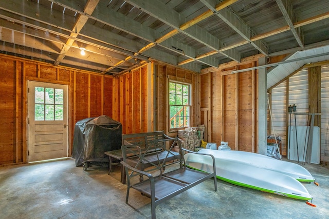 misc room featuring unfinished concrete floors