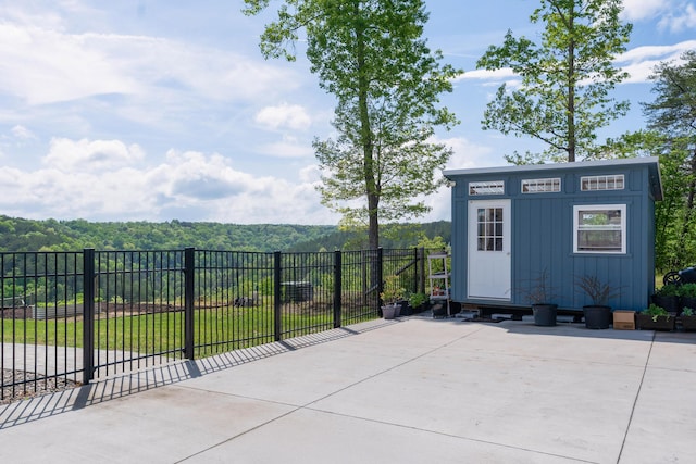 3086 Poe Rd, Soddy Daisy, TN 37379 - view of patio with fence and an outdoor structure