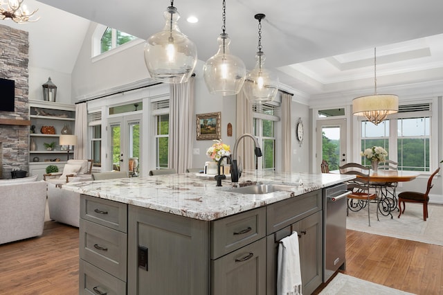 3086 Poe Rd, Soddy Daisy, TN 37379 - kitchen with a chandelier, a sink, gray cabinetry, wood finished floors, and open floor plan