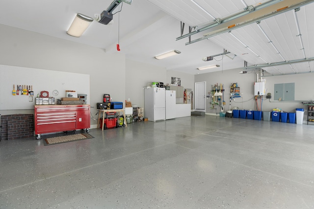 3086 Poe Rd, Soddy Daisy, TN 37379 - garage with a garage door opener and freestanding refrigerator