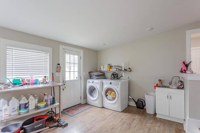 109 Sequoia Dr, Chattanooga, TN 37411 - laundry room featuring cabinet space, washer and clothes dryer, light wood-style floors, and baseboards