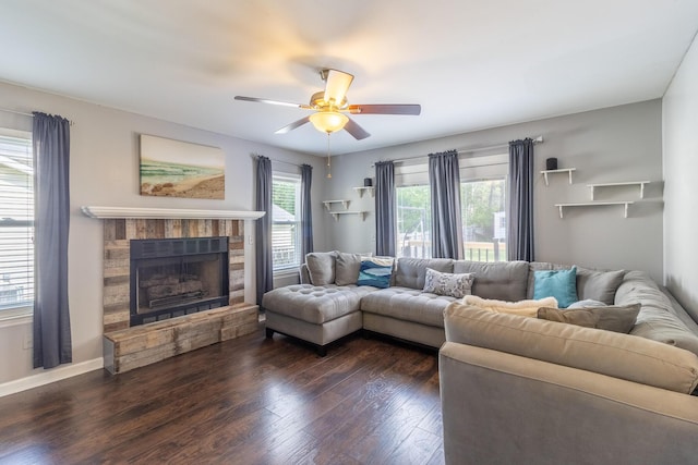 9505 Post Oak Dr, Ooltewah, TN 37363 - living area featuring baseboards, a ceiling fan, dark wood finished floors, and a fireplace with raised hearth