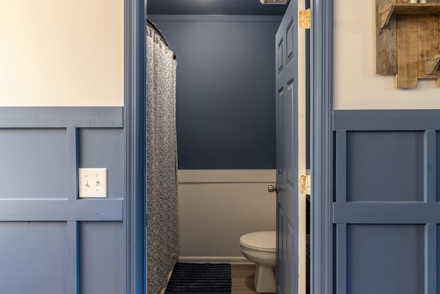 9505 Post Oak Dr, Ooltewah, TN 37363 - bathroom with a wainscoted wall and toilet