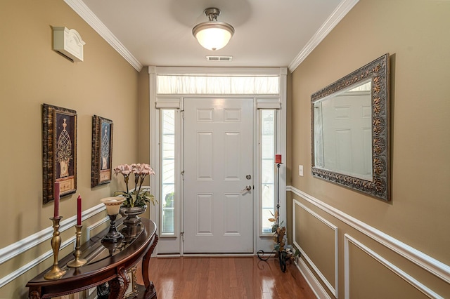 8337 Kayla Rose Cir, Ooltewah, TN 37363 - foyer featuring ornamental molding, wood finished floors, and a wainscoted wall