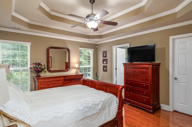 8337 Kayla Rose Cir, Ooltewah, TN 37363 - bedroom with a raised ceiling, wood finished floors, crown molding, and ceiling fan